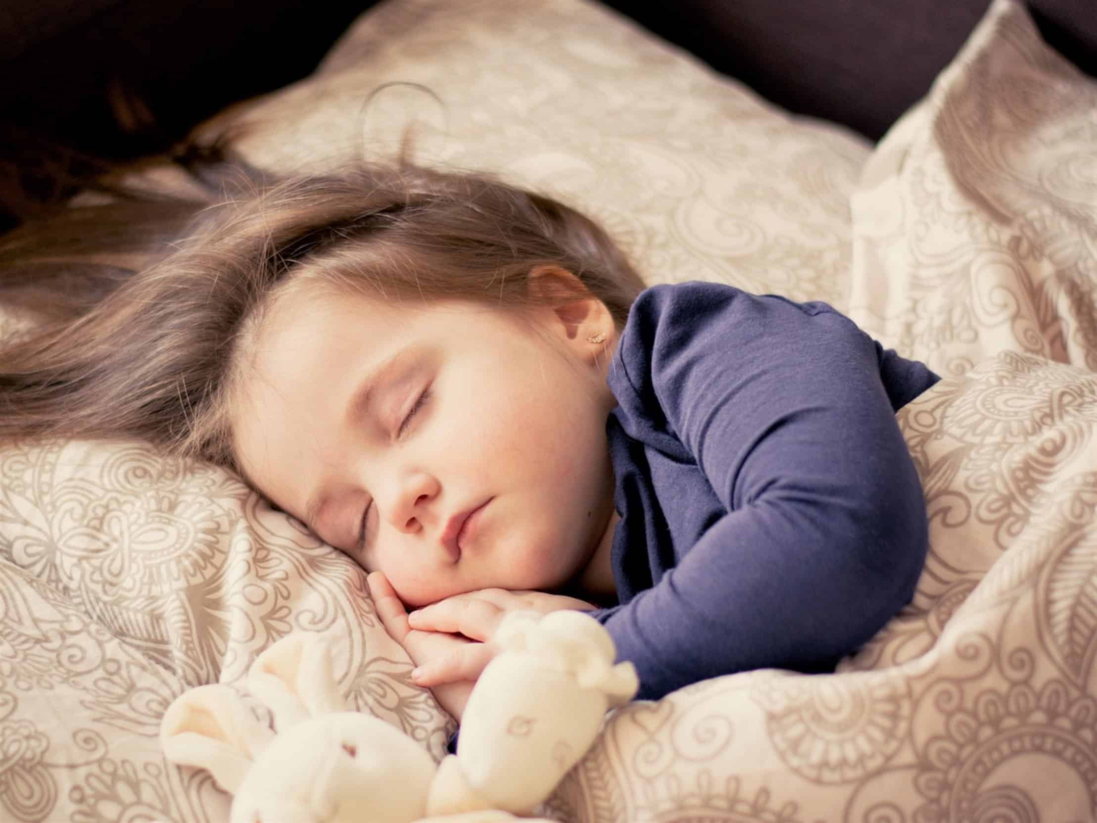 child sleeping in crib child sleeping in crib