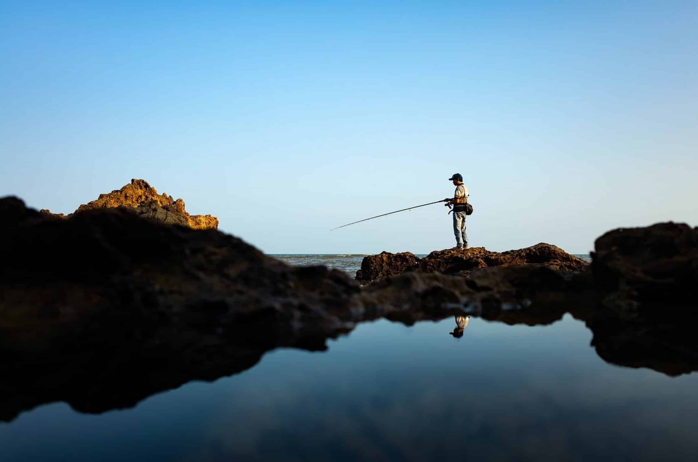 fisherman casting lure fisherman casting lure