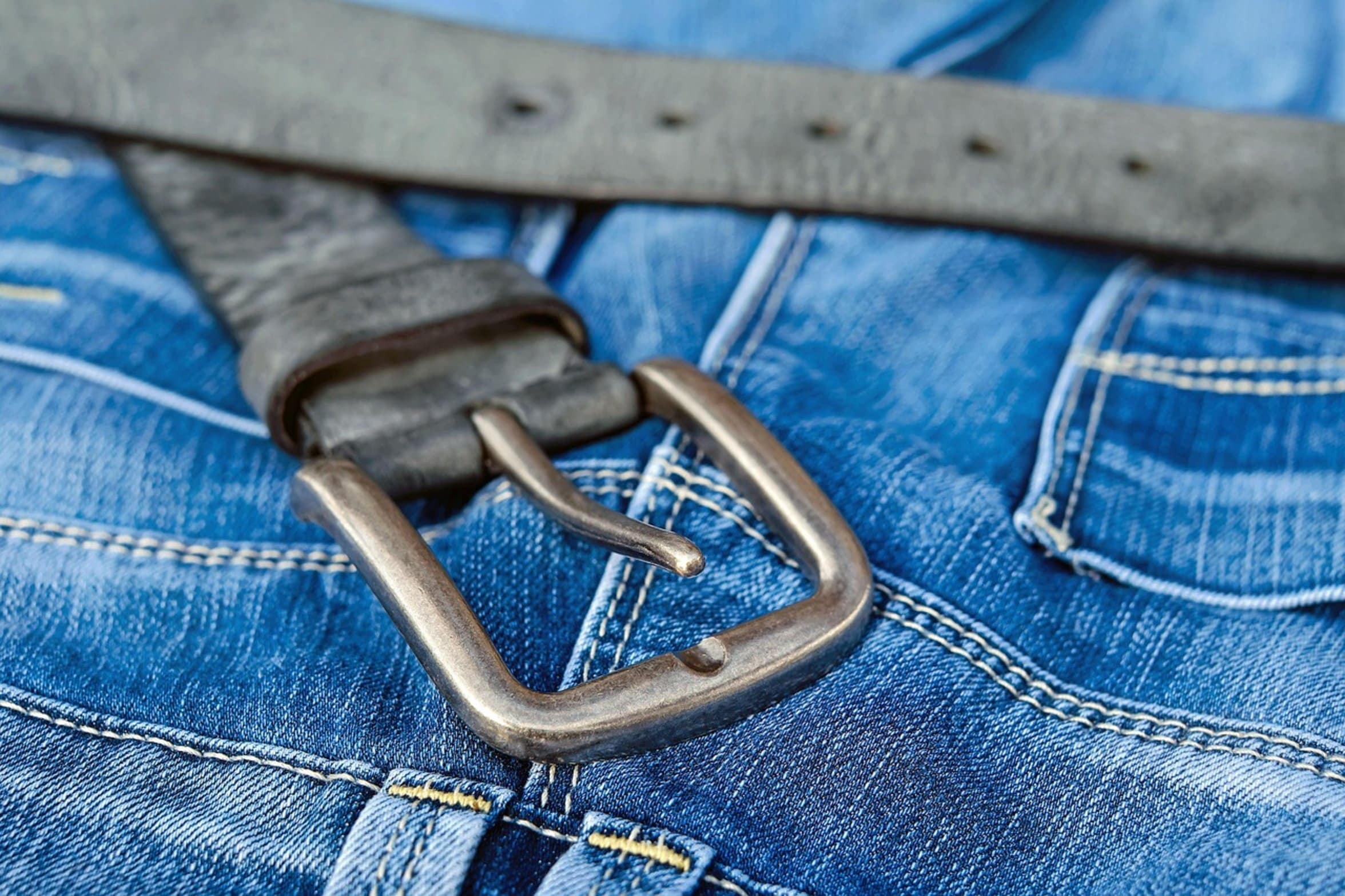 leather belt buckle close up leather belt buckle close up