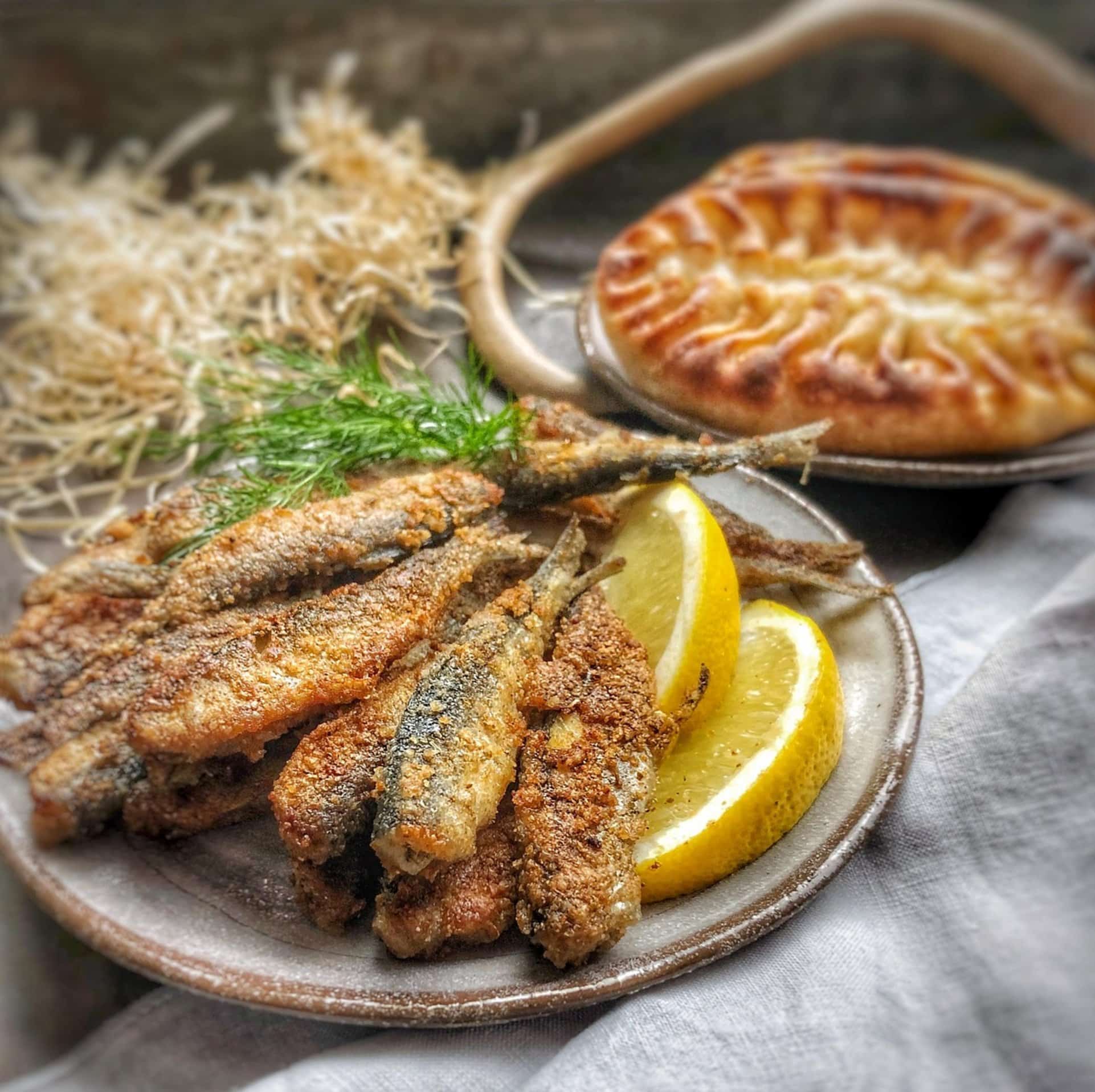 plated fried fish lemon